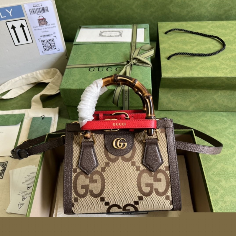G*u*i top handle bags